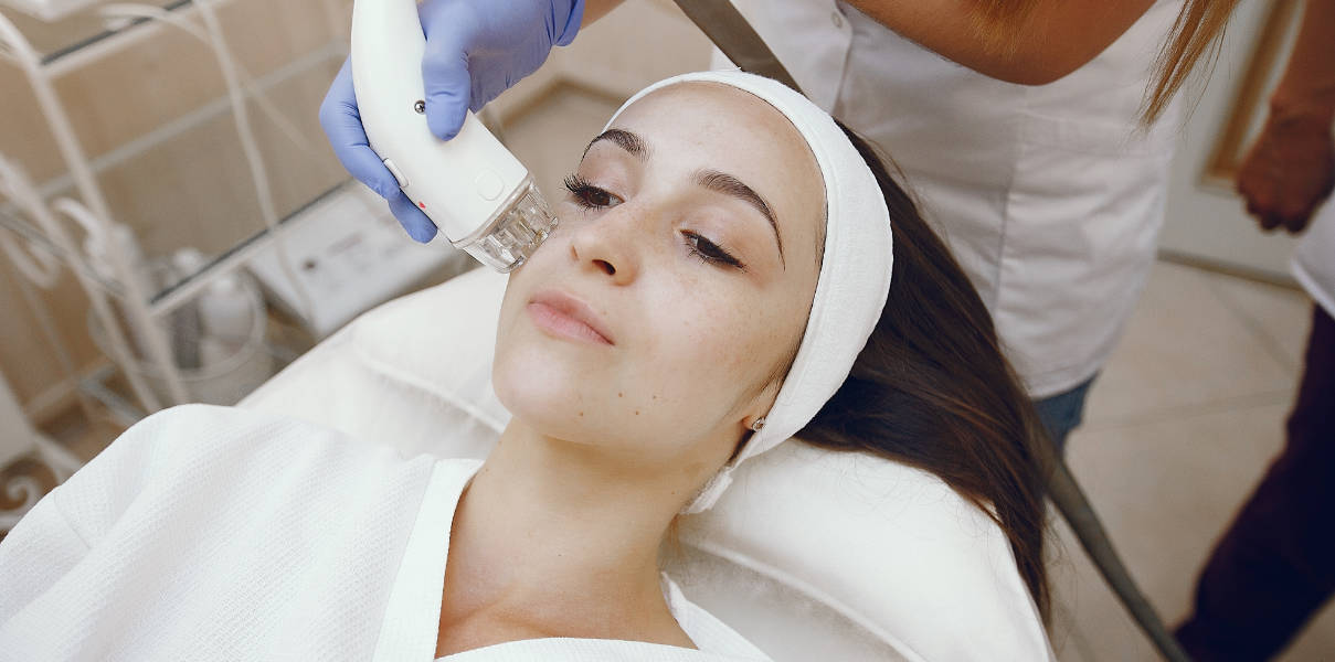 Young girl getting face mesotherapy